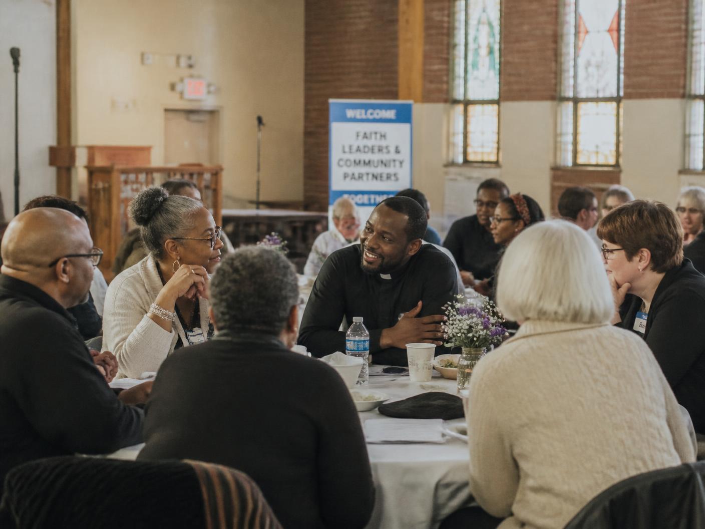 Community members gathered in conversation